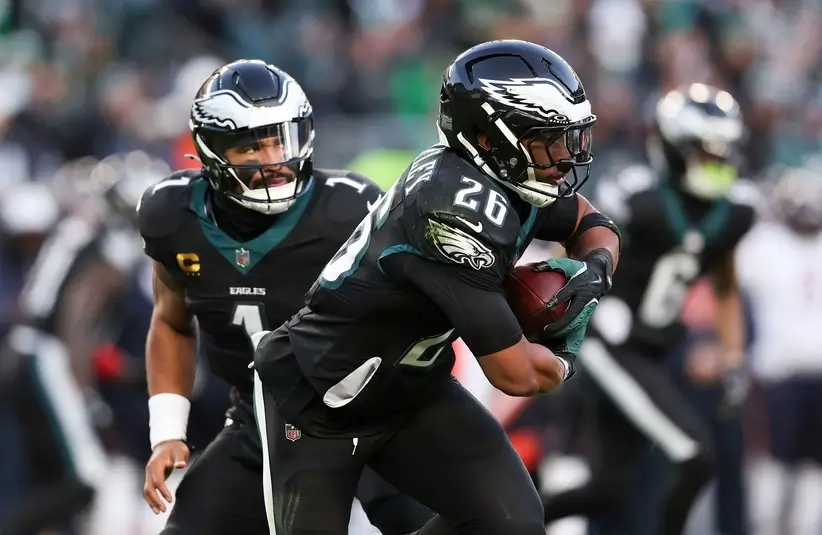 Eagles Saquon Barkley Taking a Hand Off vs Bears