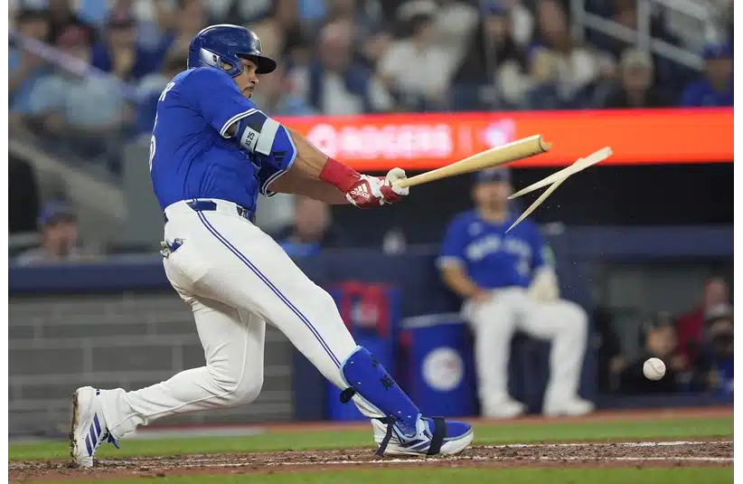 Toronto Blue Jays left fielder Anthony Santander (25) breaks his bat while hitting a foul ball against the Boston Red Sox during the sixth inning at Rogers Centre.
