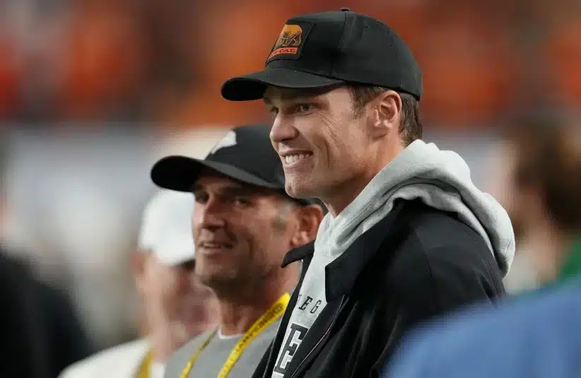 Tom Brady looks on