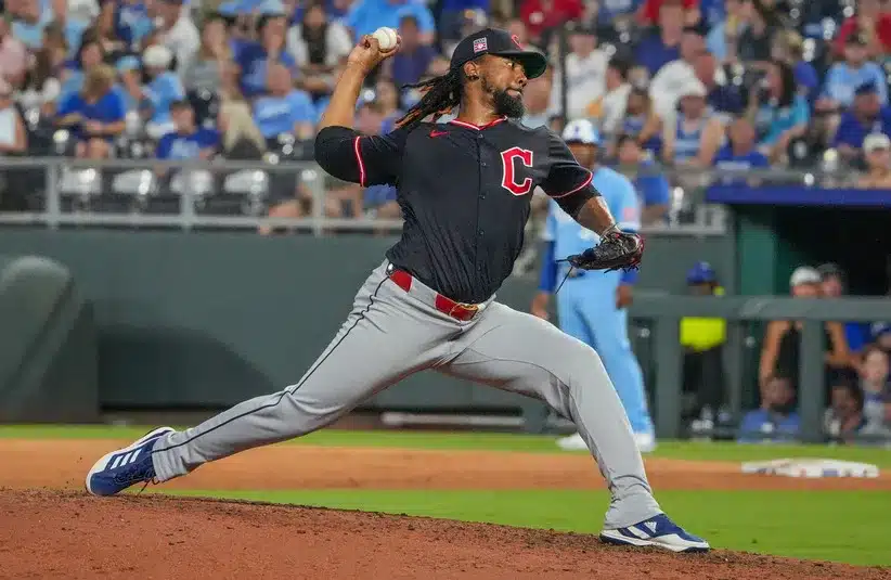 Emmanuel Clase pitching in a Guardians vs Royals baseball game in 2025